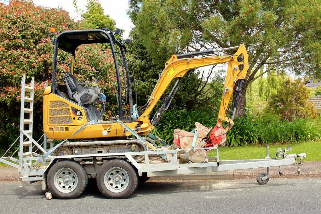 Mini Digger On A Trailer